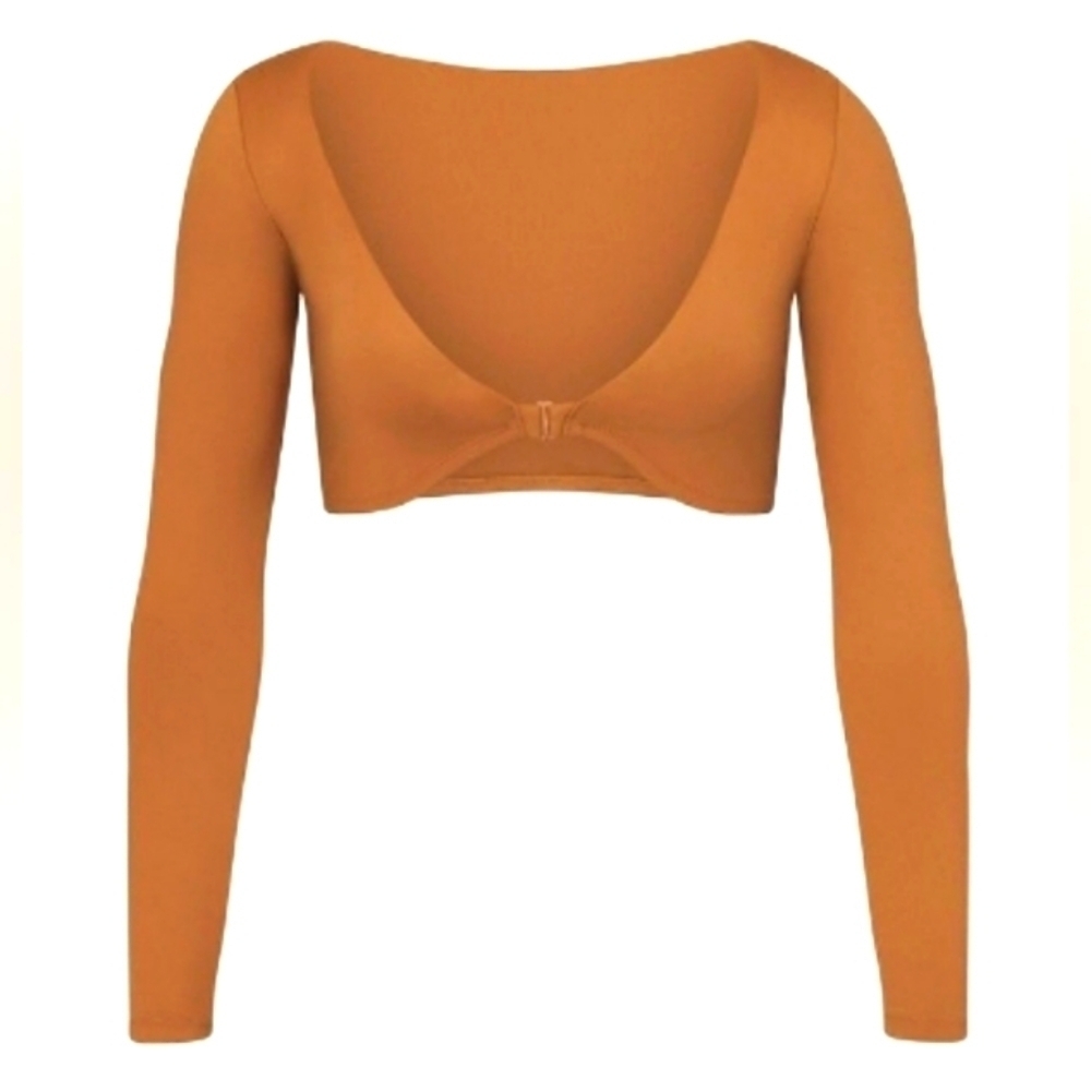 Skims long sleeve shrug.